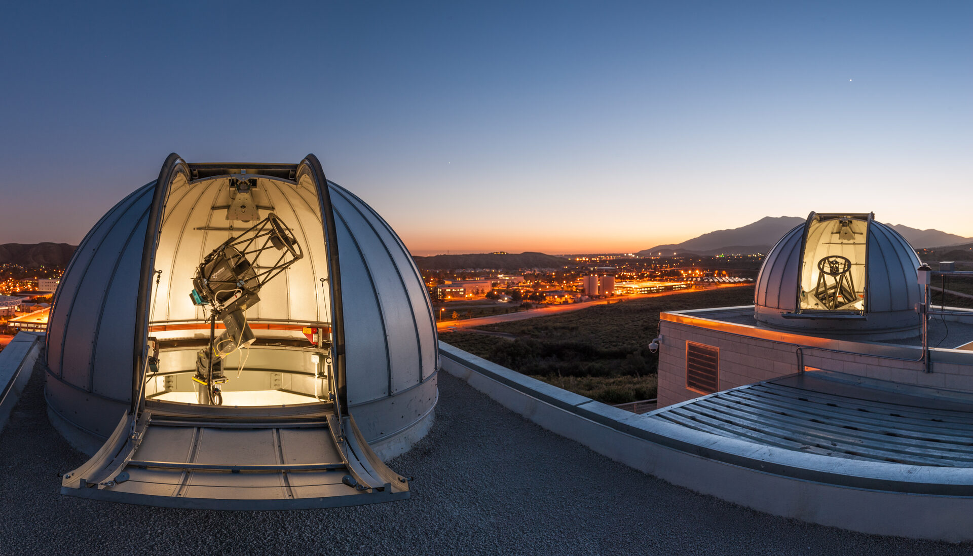 Cal State San Bernardino dual observatory domes at dusk